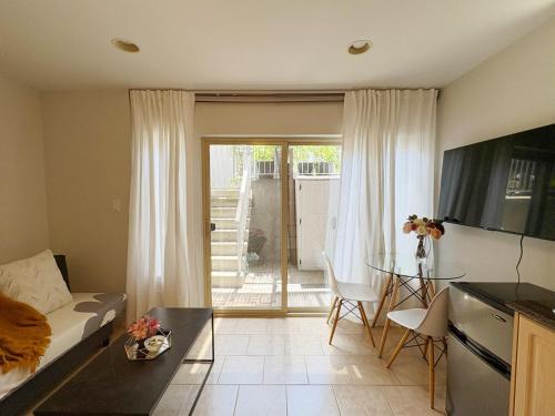 Sunset Apartment | 1BR Garden Suite with Parking and Private Entrance
