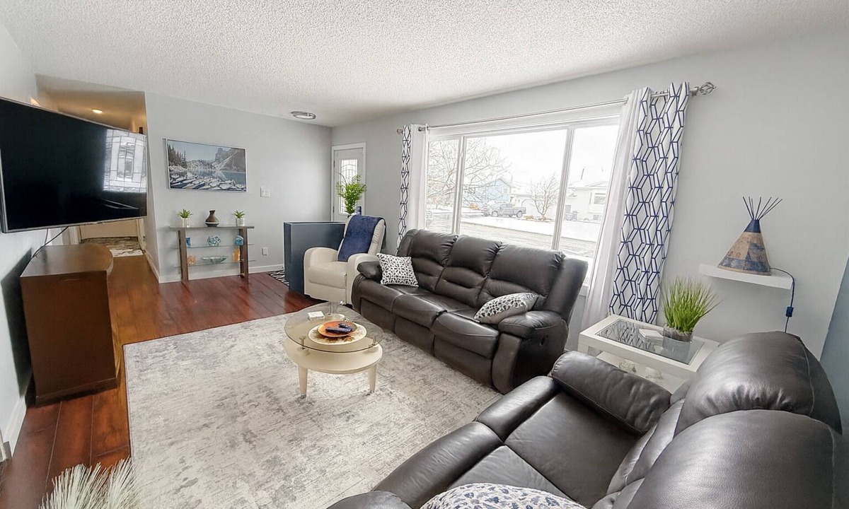 Dawson Creek House | 3 Bedrooms + 4th bed in bonus room 2 Living rooms 2 Baths Lots of parking.