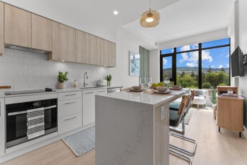 South Pandosy House | AQUA Waterfront Village - 2 Bedroom Luxury Condo