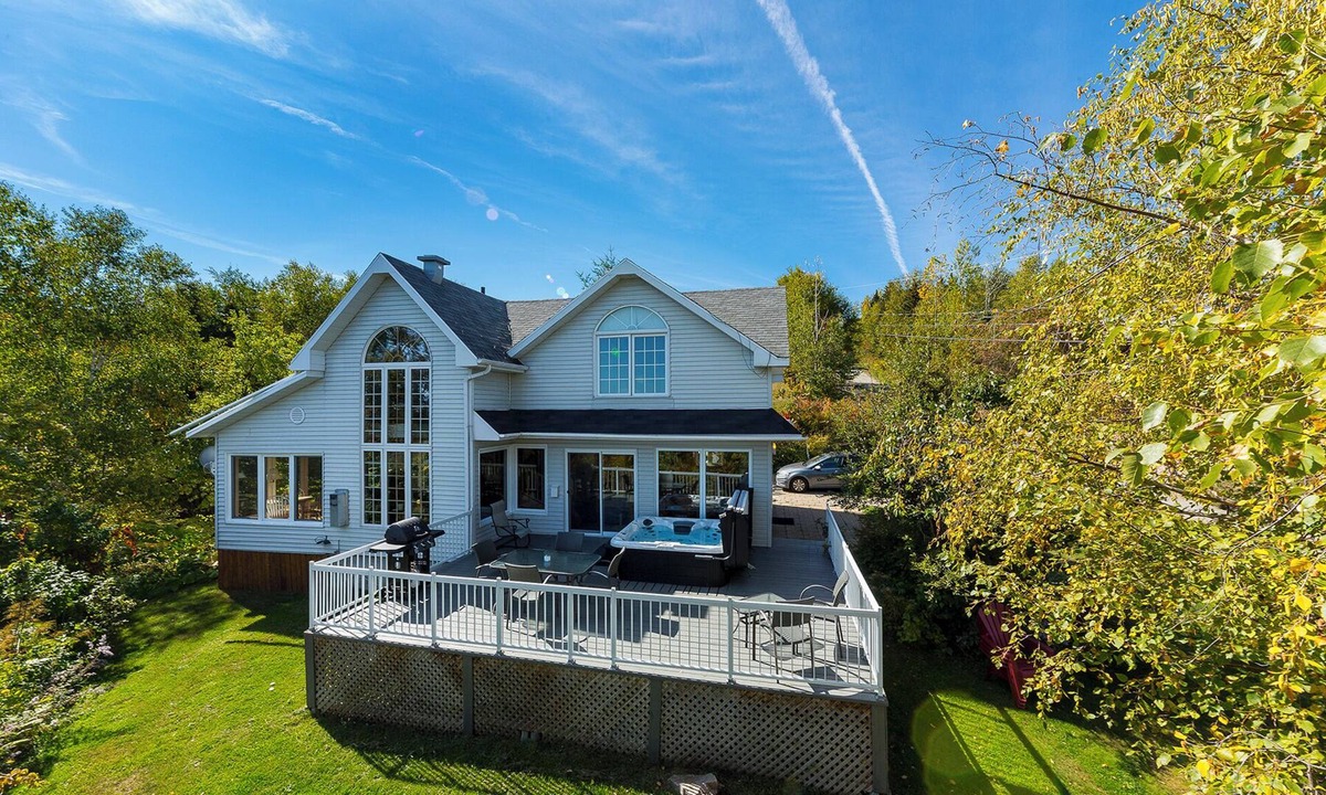 Baie-St-Paul House | Breathtaking view of river and mountains from the bedroom