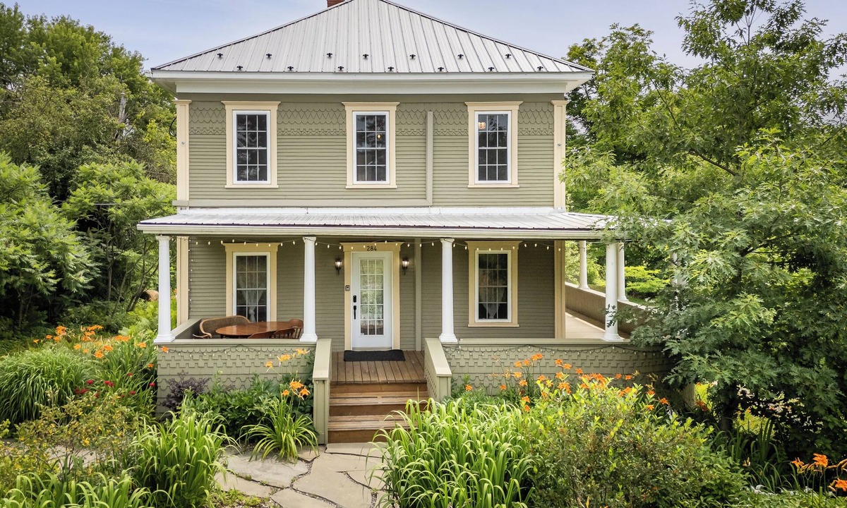 Mansonville House | Heritage home with spa, EV charger and walkable village