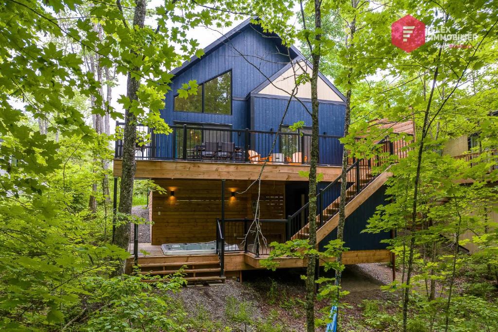 Pont-Rouge House | Le Bellevue - Chalet avec spa privé TV 65" Sonos à Pont Rouge - Resort près de Québec