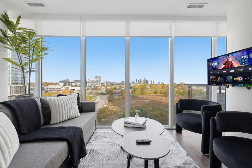 The Queensway Apartment | Modern 3BR Condo Sleeps 8 with Floor-to-Ceiling Views
