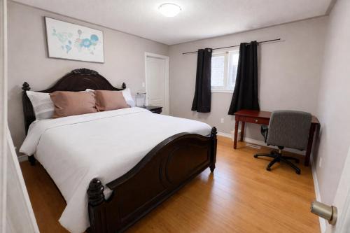 Brampton House | Private Queen Bedroom with Walk-In Closet, TV & Mini Fridge in Brampton Shared Home - 3 Baths, Full Kitchen, WiFi, Laundry & Deck - Near GO Station, Ideal for Work & Study!