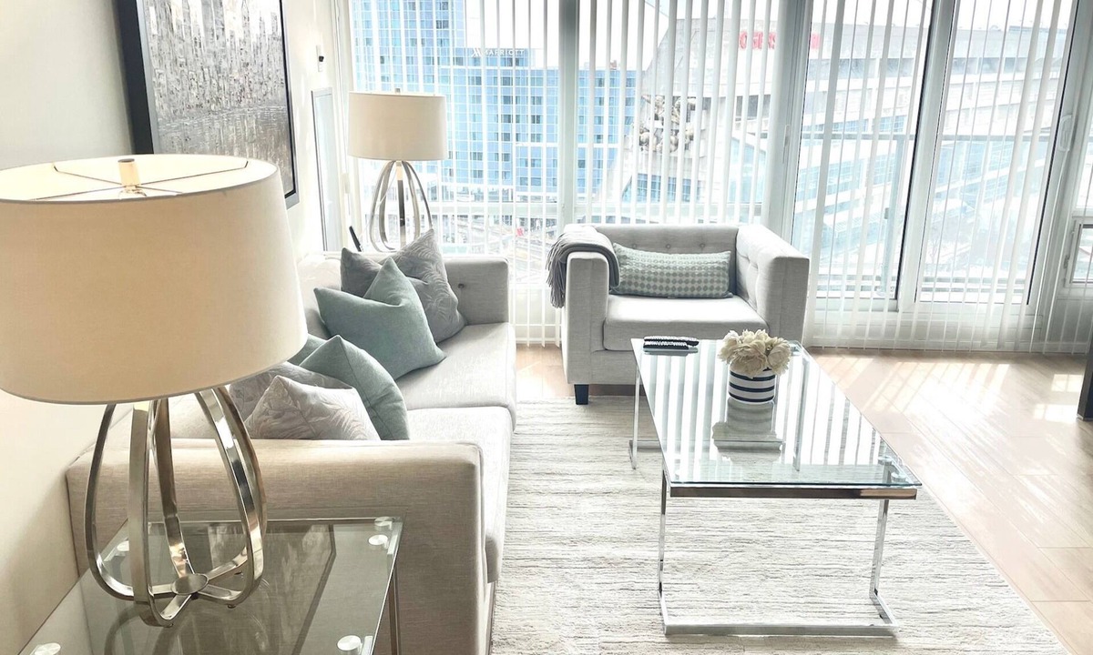 Toronto Entertainment District Condo | Roger’s Center- Downtown large two bedroom + den facing waterfront by CN Tower,