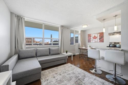Parkdale House | Stylish 2BR condo with 2 Balconies & Workspace