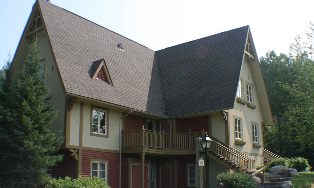 Mont-Tremblant Condo | Tremblant, ski in/out, 4 bedroom, sleeps 8, big pool, 2 decks + fire pit + pond