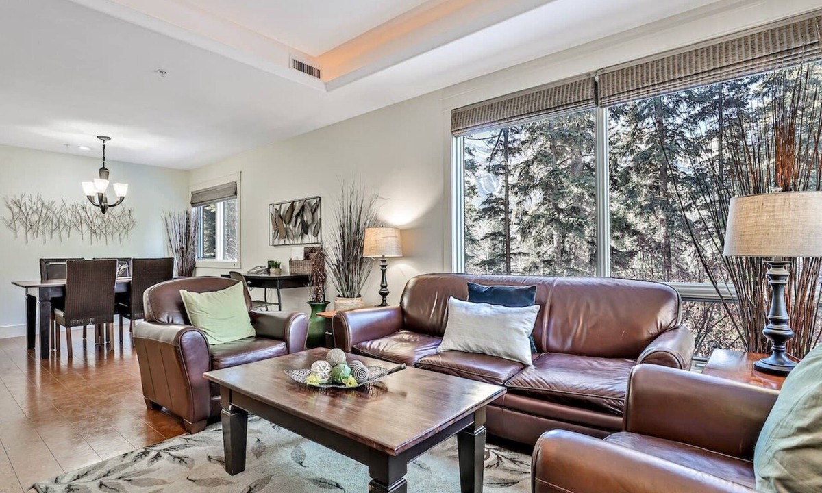 Canmore Apartment | 🌲 Woodland Retreat: 2-Bedroom Apartment Pool Treed Privacy