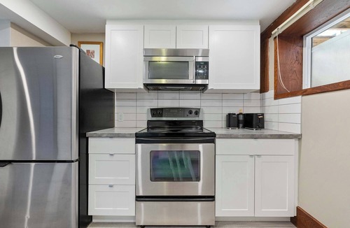 Northwest Calgary House | 2BR Cozy Suite Yoga Studio FREE Banff Pass Book Stampede!