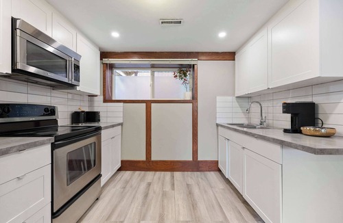 Northwest Calgary House | 2BR Cozy Suite Yoga Studio FREE Banff Pass Book Stampede!
