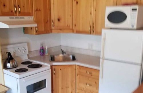 Apex Mountain Apartment | APEX Mt. ski-in ski-out near village * slope-views from covered balcony-hottub*