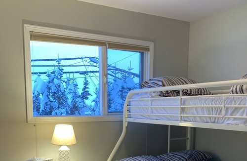 Silver Star Mountain Ski Chalet | Authentic Ski Chalet w/Gas Fireplace & Hot Tub backing onto Alpine Chairlift