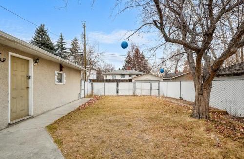 Southeast Calgary House | Bark & Bloom Bungalow Fenced Yard Pet Friendly