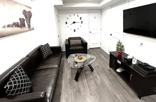 Alcona Apartment | Beautiful basement apartment with fireplace