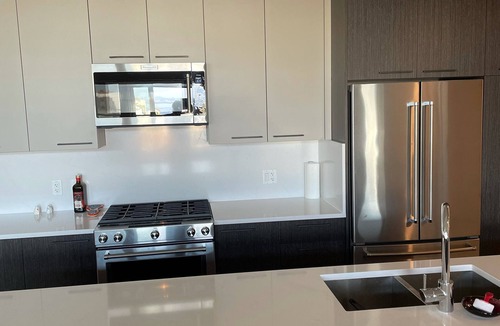Booktown Condo | Beautiful penthouse with a view in the center of downtown Sidney.