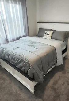 Southwest Edmonton House | Bedroom with private bathroom in Southwest