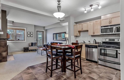 Canmore Condo | Best Relaxing King Bed Suite/Mtn. View, Heated Pool & Hot Tubs & Free Parking