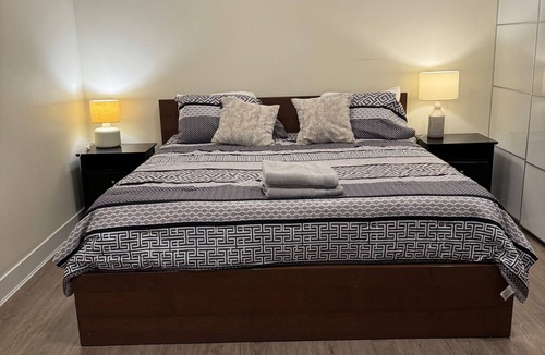 Upper Lonsdale Apartment | Big modern one-bedroom suite, full kitchen, mins away from ski resort, trails.