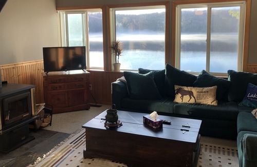 Novar Cottage | Boathouse Cottage on the water, access to snowmobile trails and ice fishing.