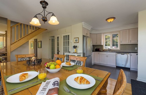 Baie-St-Paul House | Breathtaking view of river and mountains from the bedroom