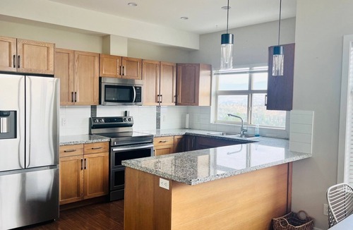 Central Okanagan Condo | Breathtaking Views in this beautiful top corner unit at Copper Sky