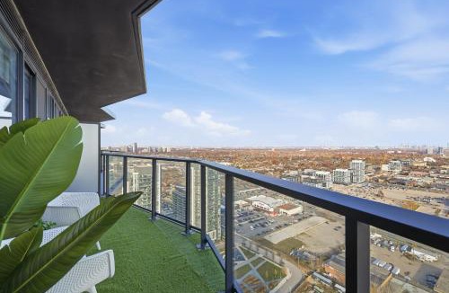 The Queensway Apartment | Bright Condo Retreat Skyline Views & Balcony
