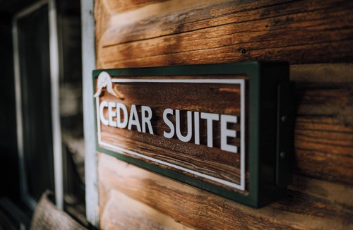 Red Deer River Crossing Cabin | Cedar Cabin: Sleeps 4 | Queen Bed | Mountain Views