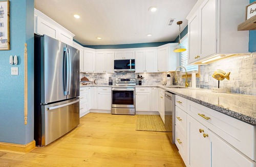 Colington Harbour House | CH50: The Sweet Pelican, 4BR home with Shared Pool- pet friendly