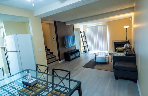 Southeast Calgary House | City 2 bedroom townhome with fireplace
