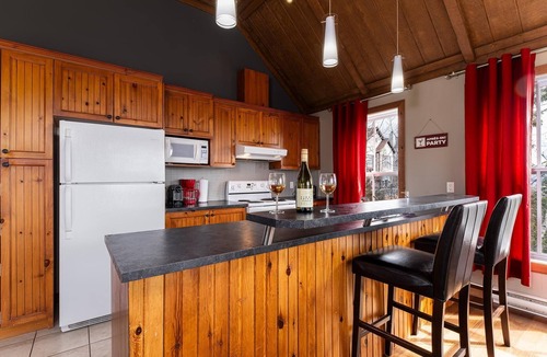 Petite-Riviere-Saint-Francois Condo | Condo 120H: Riverfront Views, Terrace & BBQ