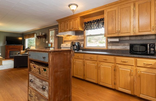 Deerfield House | Country home with cozy fireplace
