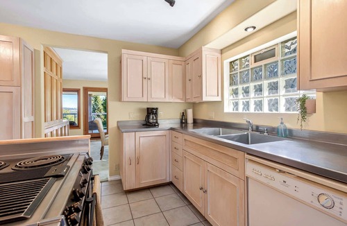 District of North Vancouver House | Cozy 3BD Retreat, North Van Balcony Views