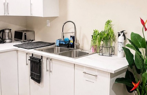 Winnipeg House | Cozy and beautifully furnished 2 bedroom basement suite in Devonshire