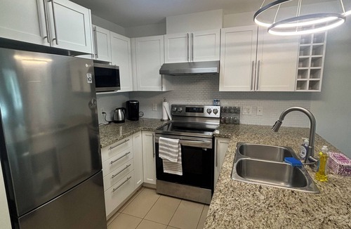 North End Apartment | Cozy and clean, spacious downtown apartment across from the beach.
