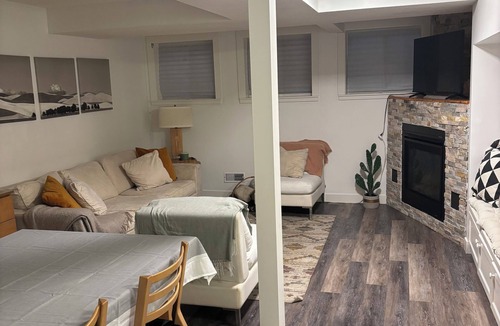 Cedarbrae House | Cozy basement suite w/fireplace. Pet friendly!