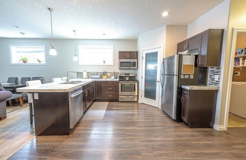 Grande Prairie House | Cozy Private Suite | Free WIFI | Stocked Kitchen