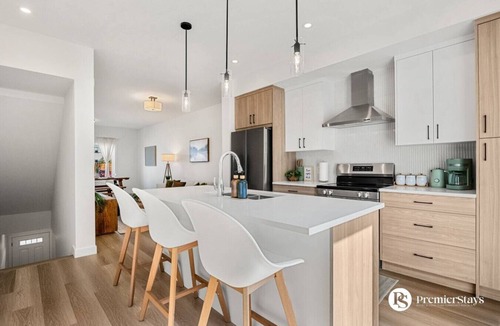 Springbank Hill House | Designer-Inspired Home » King Bed » Garage » AC #21