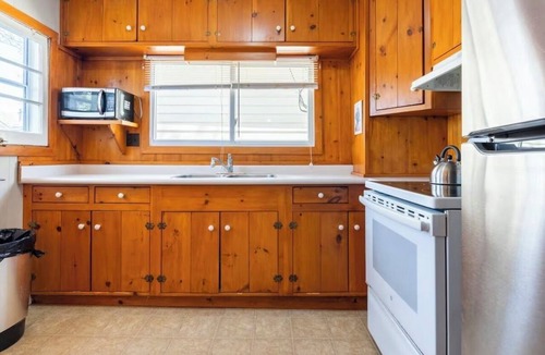 Grand Bend Cottage | DOWNTOWN GRAND BEND! steps to the step and main beach open this weekend!