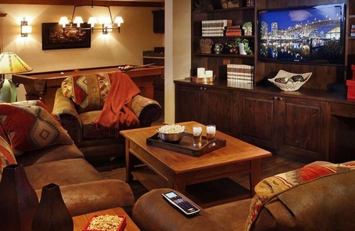 Invermere Cabin | Expansive porch with outdoor fireplace! Rec room inc pool and snooker tables