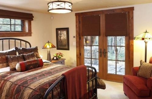 Invermere Cabin | Expansive porch with outdoor fireplace! Rec room inc pool and snooker tables