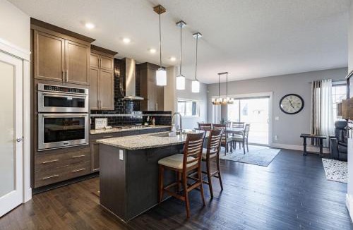 Southeast Edmonton House | Group Getaway with Yard, Sleeps 13, Near YEG Airpt