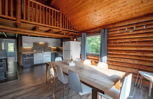 Saint-Leonard-de-Portneuf Cabin | Handcrafted Log Chalet with Hot Tub and Fire Pit
