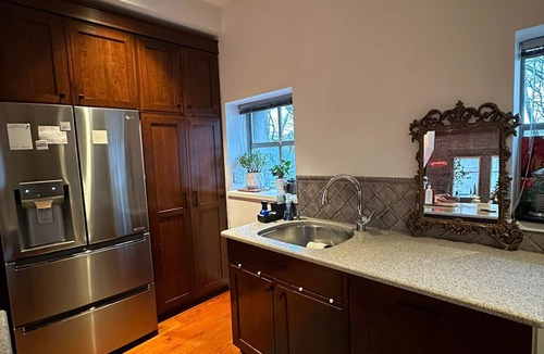 Kitsilano House | Heritage Townhome Steps from the Beach in Kitsilano with Private Rooftop Patio