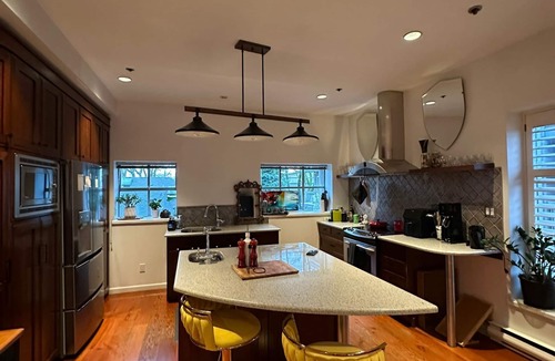 Kitsilano House | Heritage Townhome Steps from the Beach in Kitsilano with Private Rooftop Patio