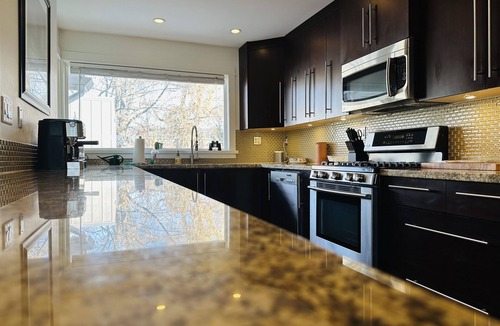 Kelowna Central Business District House | Home Close to Beach and Downtown. Licensed short term rental.