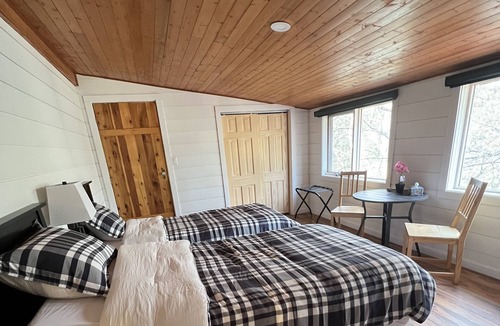 Whitecourt Ski Chalet | Large Log House with River Views