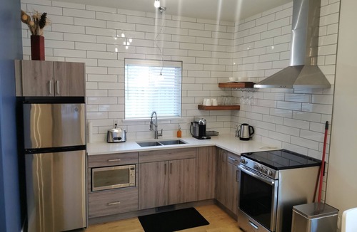 Kitimat Apartment | Lux Quarters Kitimat River Suite. Quiet neighborhood, Private yard.