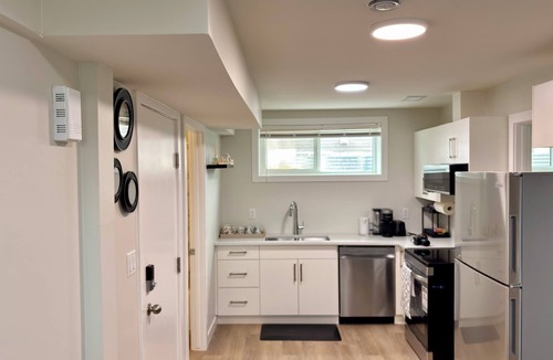 Saskatoon House | LUXLOFT SUITE. Cozy 2-bedroom basement suite in a serene location.