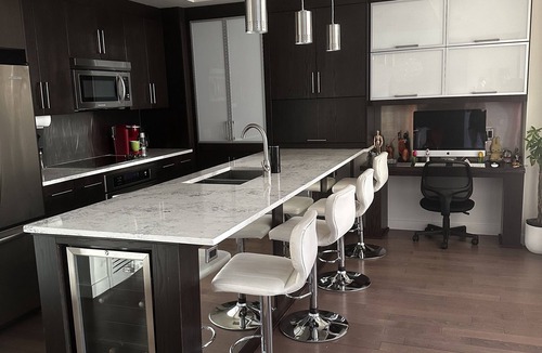 Connaught Condo | Luxury 2 bedroom 2 bath penthouse in downtown Calgary with underground parking