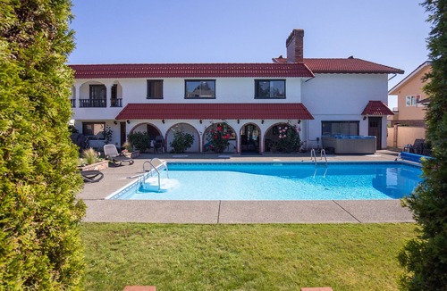 Departure Bay House | Mid Century Modern Home with Pool and Hot Tub